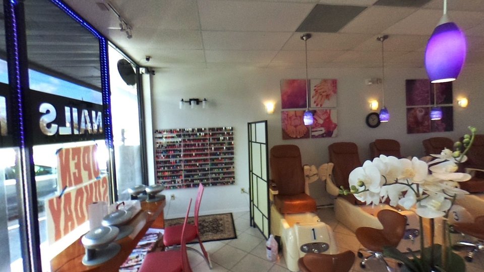 Spa services area with manicure tools nearby.